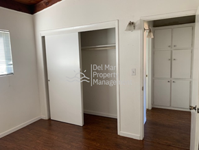 Arroyo Grande apartment for rent - A room with a white door and a sign that says Del Mar Property Management.