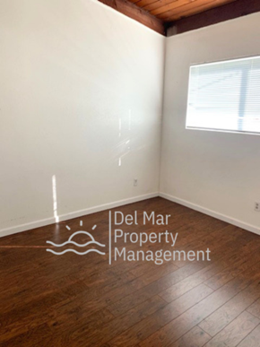 Arroyo Grande apartment for rent - A room with a window and a wooden floor.