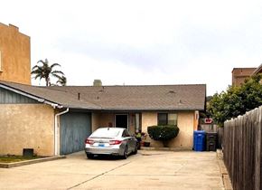 Grover Beach house for rent - A house with a car parked in front.