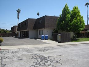 Arroyo Grande apartment for rent - A house with a driveway and a tree in front of it.