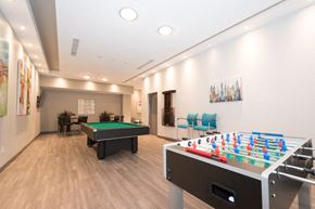 Hamilton apartment for rent - a game room with a foosball table and a pool table