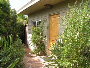 San Diego apartment for rent - A house with a brown door and a brown fence.