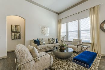 Living room with oversized windows and doors
