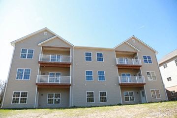 St. Louis apartment for rent - a large apartment building with balconies