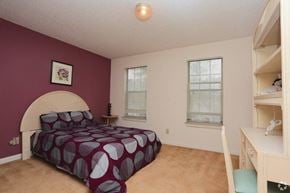 Jonesboro apartment for rent - a bedroom with a bed and a closet