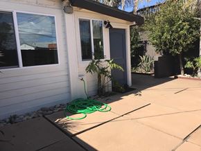 San Diego apartment for rent - a garden hose on the side of a house