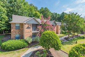Durham apartment for rent - an aerial view of a brick house with trees