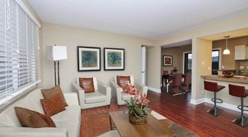 Charlotte apartment for rent - a living room with a couch and a table