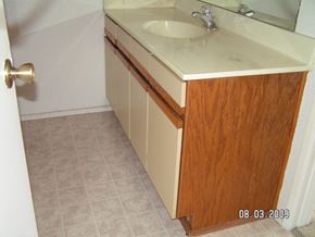 San Diego apartment for rent - A bathroom with a sink and a mirror.