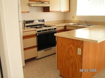San Diego apartment for rent - A kitchen with a stove and oven.