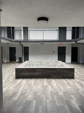 West Hollywood apartment for rent - the main room of the building has a dance floor and a balcony