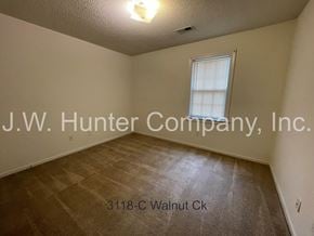 Wilson apartment for rent - A room with J.W. Hunter Company, Inc. written on the wall.