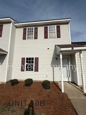 Wilson apartment for rent - A house with the text "UNIT 10B" on the front yard.