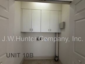 Wilson apartment for rent - A white room with a sign that says J.W. Hunter Company, Inc. UNIT 10B.