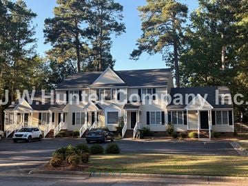 Wilson apartment for rent - A house with the name J.W. Hunter Company Inc written on it.