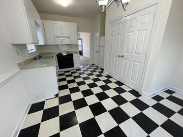 Wilson apartment for rent - A black and white checkered floor in a kitchen.