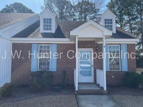 Wilson apartment for rent - A brick house with the name J.W. Hunter Company Inc written on it.