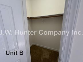 Wilson apartment for rent - A room with carpeted floor and white walls, labeled Unit B.