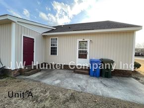 Wilson apartment for rent - A small building with a red door is labeled as Unit A.