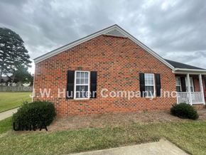 Wilson apartment for rent - A brick house with a sign that says W. Hunter Company Inc.