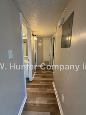 Wilson apartment for rent - A hallway with a V. Hunter Company sign on the wall.