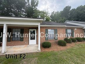 Wilson apartment for rent - A house with the text "J.W. Hunter Company Inc" on the side.