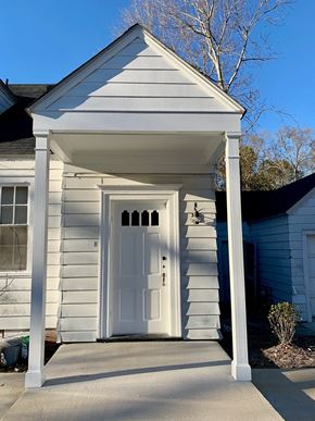 Wilson apartment for rent - A white door is on the front of a house.