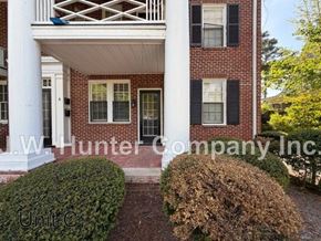 Wilson apartment for rent - A house with a porch and a sign that says "W.W. Hunter Company Inc."