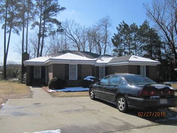 Wilson apartment for rent - a house with a car parked in front of it