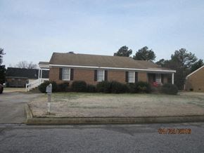 Wilson apartment for rent - a brick house on the side of a street