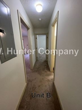 Wilson apartment for rent - A long hallway with the words "Unit B" on the floor.