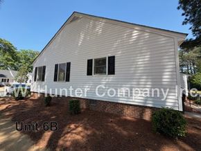 Wilson apartment for rent - A white building with the words Hunter Company on it.