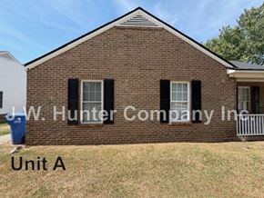 Wilson apartment for rent - A brick house with the text J.W. Hunter Company Inc. Unit A on it.