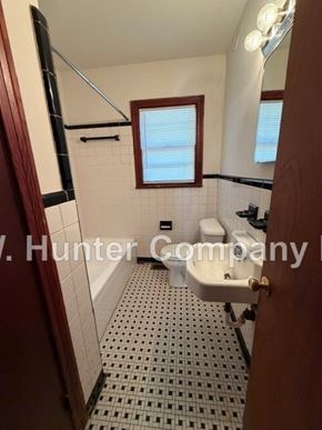 Wilson apartment for rent - A bathroom with a Hunter Company sign.
