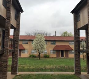 Stillwater apartment for rent - an apartment building with a tree in the yard
