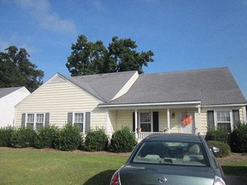 Wilson apartment for rent - a house with a car parked in front of it