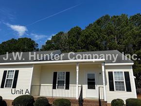 Wilson apartment for rent - A house with the name J.W. Hunter Company Inc. written on it.