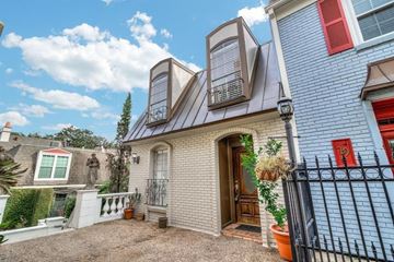 Houston house for rent - the front of a house with a fence and a door