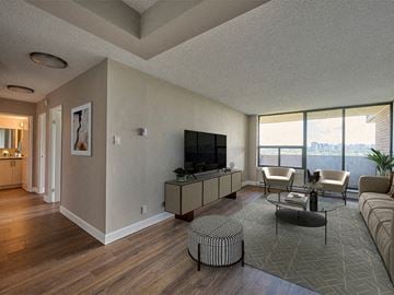 Ottawa apartment for rent - a living room with a couch and a television