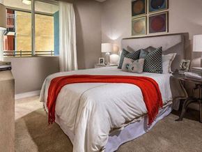 Long Beach apartment for rent - a bedroom with a bed and some pillows