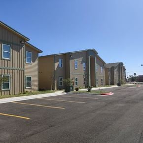 Edinburg apartment for rent - an empty parking lot in front of an apartment building