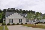 Rocky Mount apartment for rent - a white house with black shutters and a tree