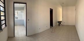 San Juan apartment for rent - an empty living room with white walls and a tile floor