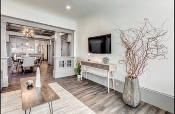 Sacramento apartment for rent - a living room with a tv and a table