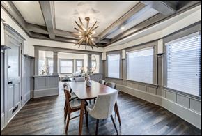 Sacramento apartment for rent - a dining room with a table and chairs and a chandelier