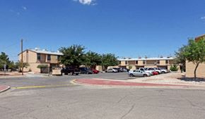 El Paso apartment for rent - a street with cars parked in a parking lot