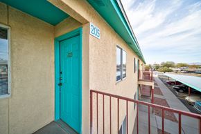 El Paso apartment for rent - A blue door with the number 205 on it.