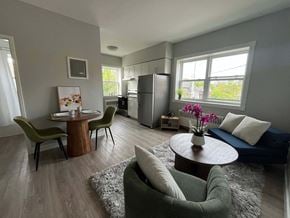 Windsor apartment for rent - A modern living room with a dining table and chairs.