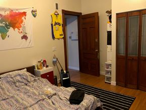New Haven apartment for rent - a bedroom with a bed and a door to a closet