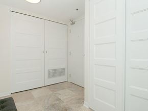 Ottawa apartment for rent - A room with white doors and a tiled floor.